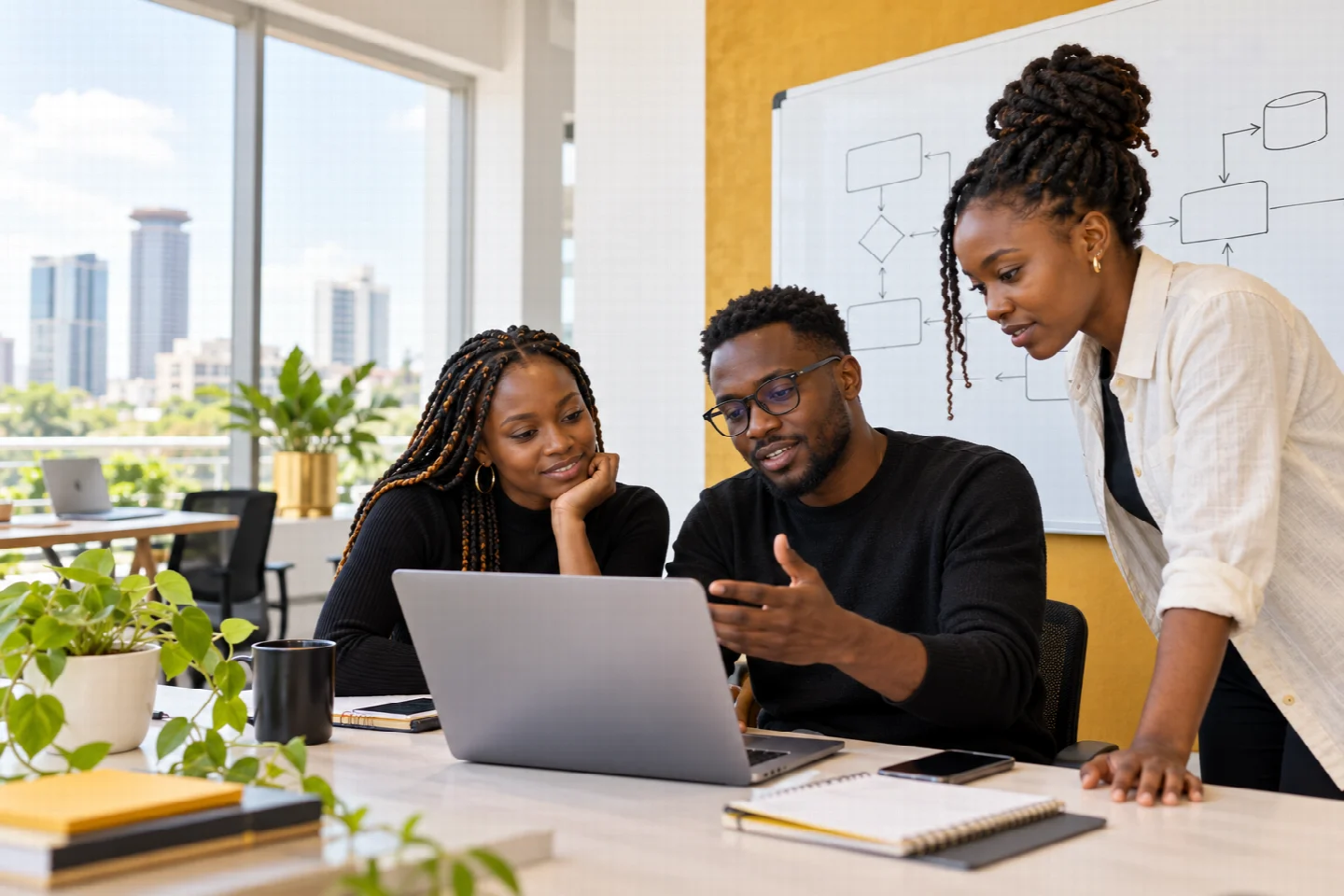 Kenyan technology professionals sharing ideas and solving a problem